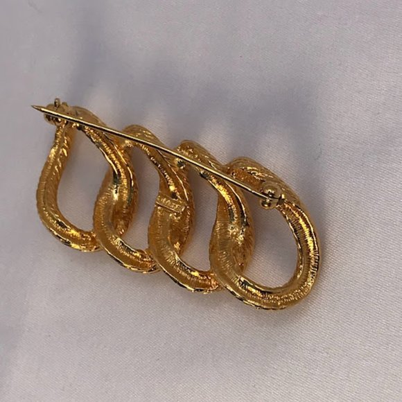 MONET Gold-tone Four Textured Rings Brooch - Picture 3 of 5